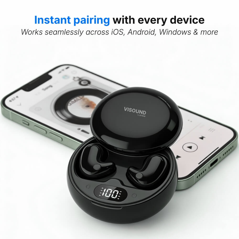 Product photo featuring black VISOUND wireless earbuds in an open charging case displaying 100% battery, alongside a smartphone playing music with a dog's face album cover, with overlaid text promoting instant pairing with every device across iOS Android and Windows